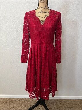 This is a crimson red floral lace long-sleeve midi cocktail dress with a V-neck
